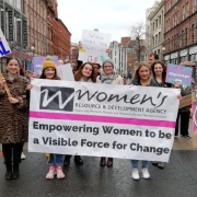 Women holding the WRDA banner.
