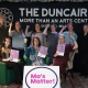 The WRDA team on stage at the Duncairn for the Mas project.